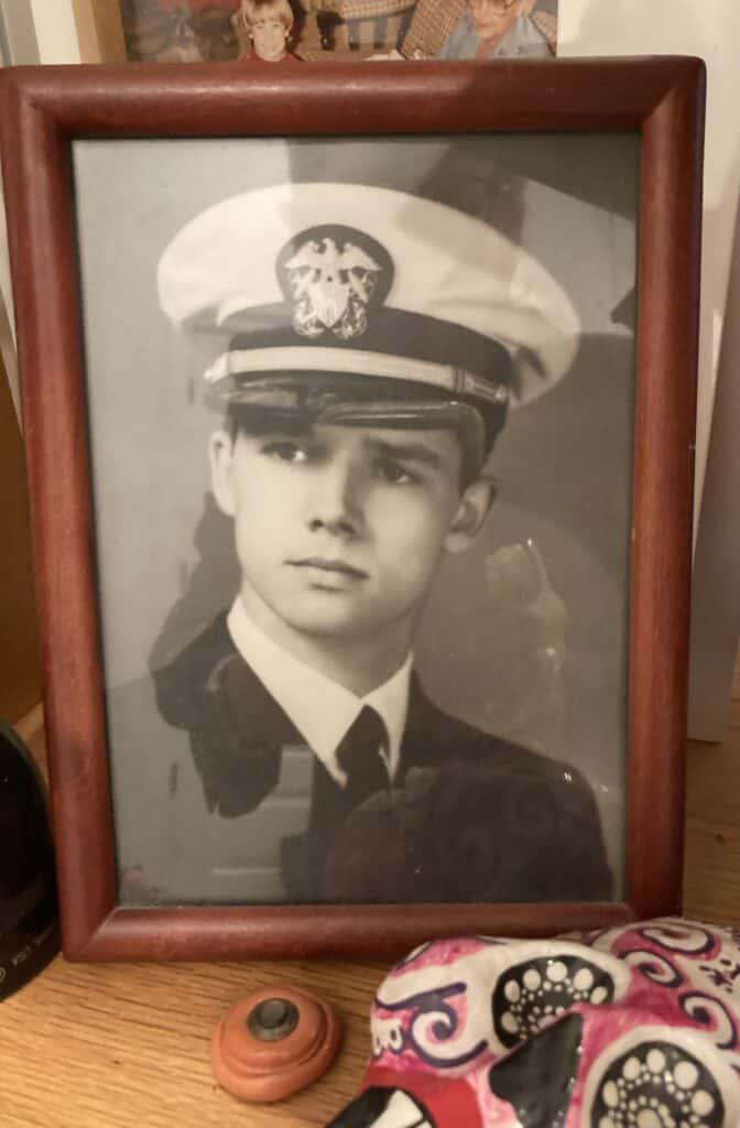 Photo of young man in Naval uniform and hat. Daddy Joe Veterans Day