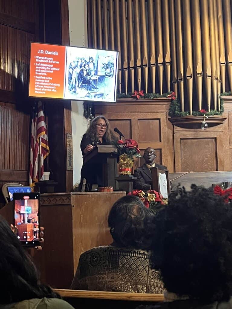 Dr. Beth Kruse discussing the Vicksburg Massacres at Bethel AME Church