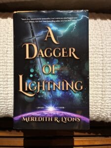 Cover of A Dagger of Lightning featuring a streak of lightning and a sword. 